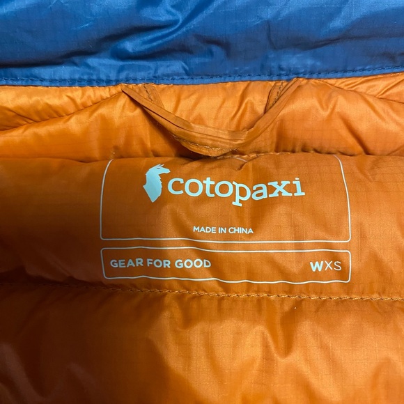 cotopaxi Teal Packable Down Vest with Blue and Orange Stripes - Picture 3 of 5
